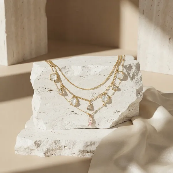 The99jewel_Gold_Plated_Triple_Layered_Coastal_Inspired_Fish_And_Shell_Charms_Western_Necklace_White