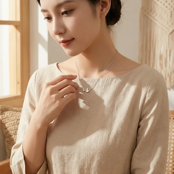 Silver-Toned_Bird_Pendant_Necklace_With_Delicate_Chain