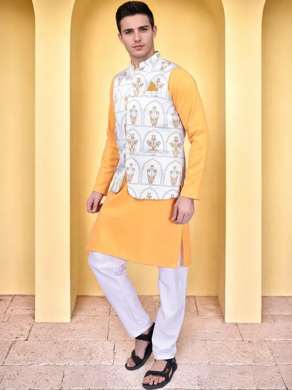 Men's_White_Printed_Nehru_Jacket_With_Yellow_Kurta_And_White_Churidar_Set