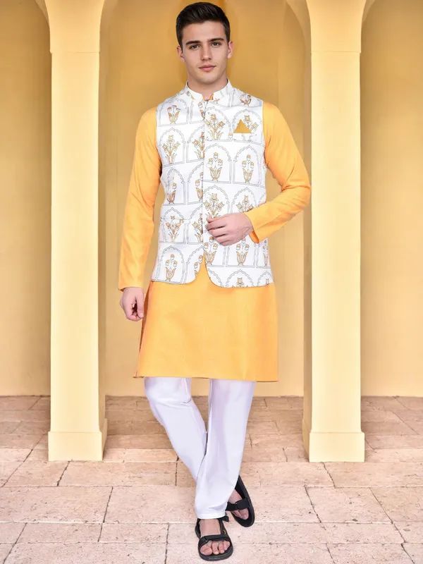 Men's_White_Printed_Nehru_Jacket_With_Yellow_Kurta_And_White_Churidar_Set