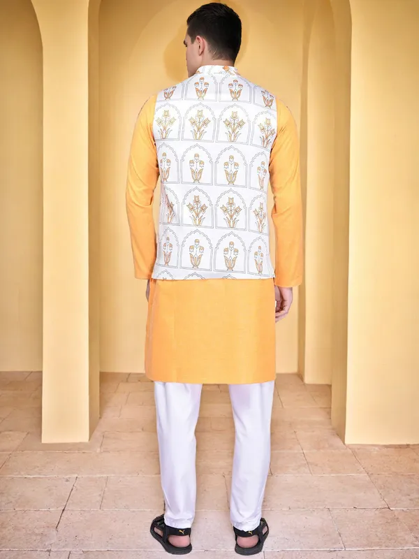 Men's_White_Printed_Nehru_Jacket_With_Yellow_Kurta_And_White_Churidar_Set