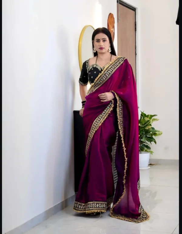 Elegant_Magenta_Saree_With_Embroidered_Black_Blouse
