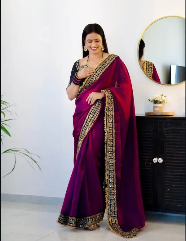 Elegant_Magenta_Saree_With_Embroidered_Black_Blouse