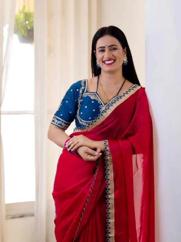 Red_Fancy_Satin_Saree_With_Blue_Embroidered_Blouse_And_Golden_Border