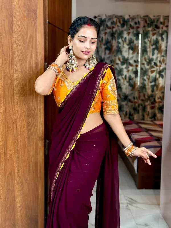 Deep_Wine_Chiffon_Saree_With_Golden_Yellow_Embroidered_Blouse