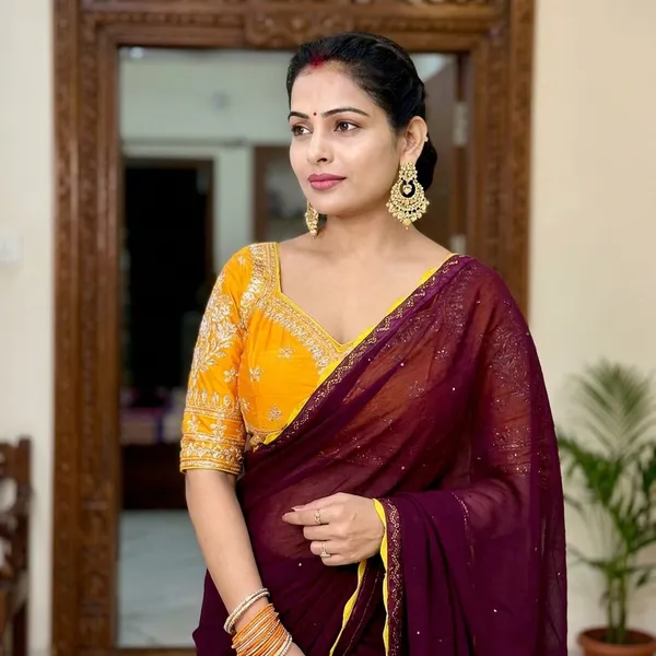 Deep_Wine_Chiffon_Saree_With_Golden_Yellow_Embroidered_Blouse