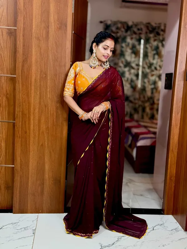 Deep_Wine_Chiffon_Saree_With_Golden_Yellow_Embroidered_Blouse