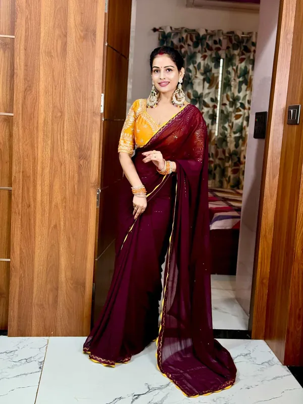 Deep_Wine_Chiffon_Saree_With_Golden_Yellow_Embroidered_Blouse