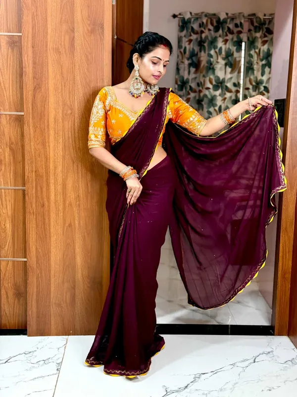 Deep_Wine_Chiffon_Saree_With_Golden_Yellow_Embroidered_Blouse