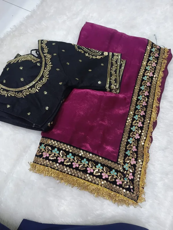 Elegant_Magenta_Saree_With_Embroidered_Black_Blouse
