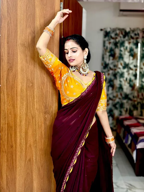 Deep_Wine_Chiffon_Saree_With_Golden_Yellow_Embroidered_Blouse