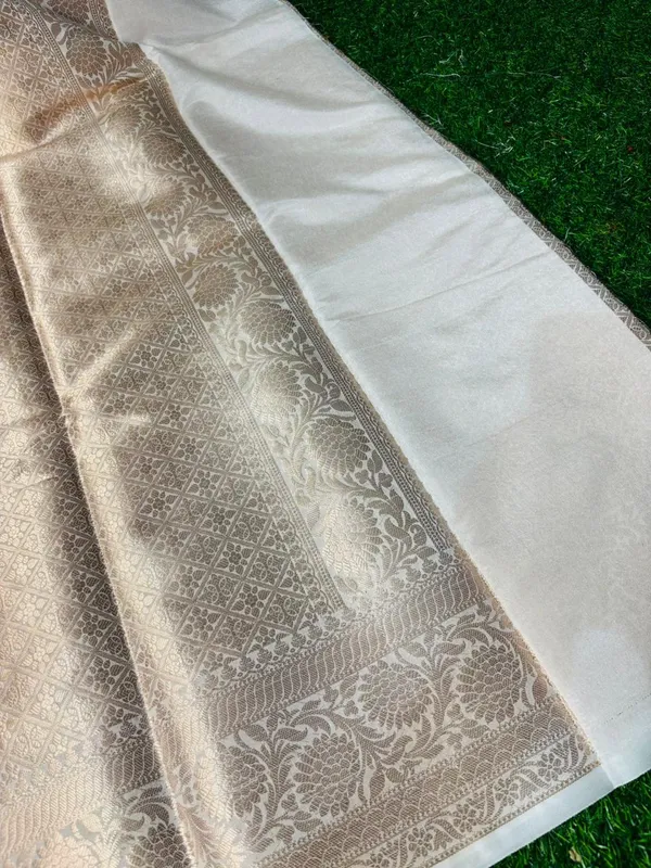 Premium_White_Banarasi_Silk_Saree_With_Golden_Zari_Border_And_Buti_Work