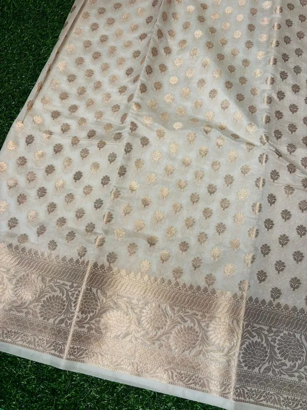 Premium_White_Banarasi_Silk_Saree_With_Golden_Zari_Border_And_Buti_Work
