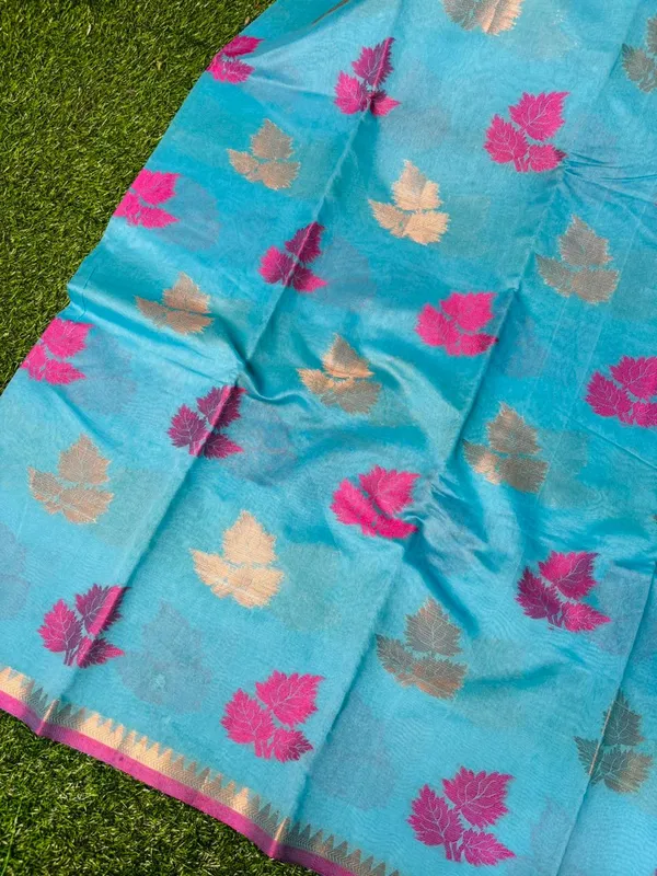 Sky_Blue_Banarasi_Cotton_Silk_Saree_With_Colorful_Floral_Motifs_And_Golden_Border