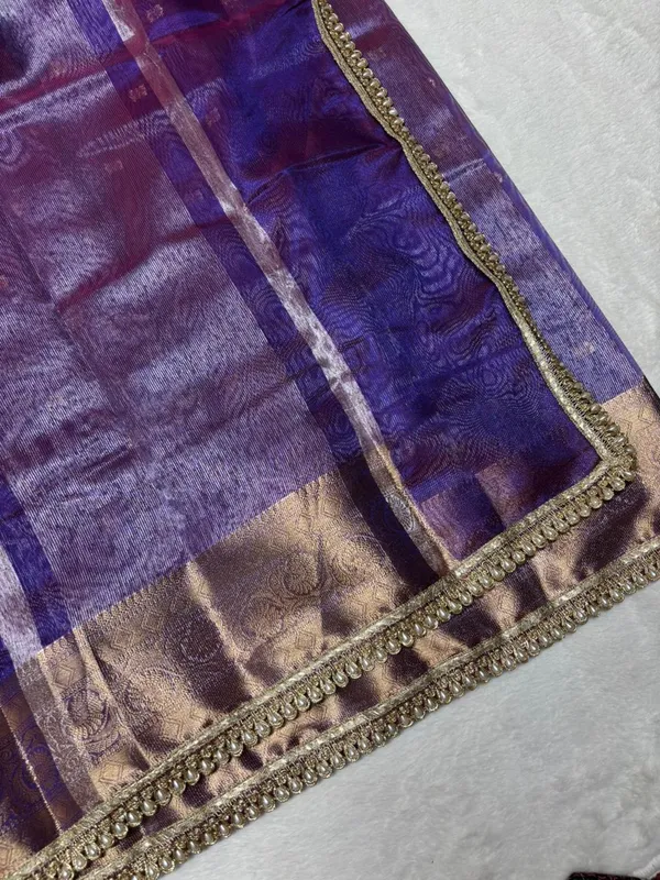 MATALLIC_PURPLE_TISSUE_SILK_SAREE_WITH_HEAVY_JARKAN_LACE_WORK