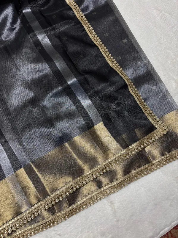 MATALLIC_BKACK_TISSUE_SILK_SAREE_WITH_HEAVY_JARKAN_LACE_WORK