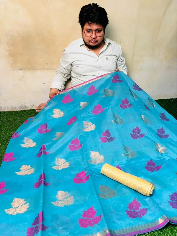 Sky_Blue_Banarasi_Cotton_Silk_Saree_With_Colorful_Floral_Motifs_And_Golden_Border
