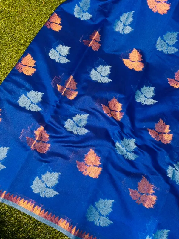 Royal_Blue_Banarasi_Cotton_Silk_Saree_With_Colorful_Leaf_Motifs_And_Contrast_Border