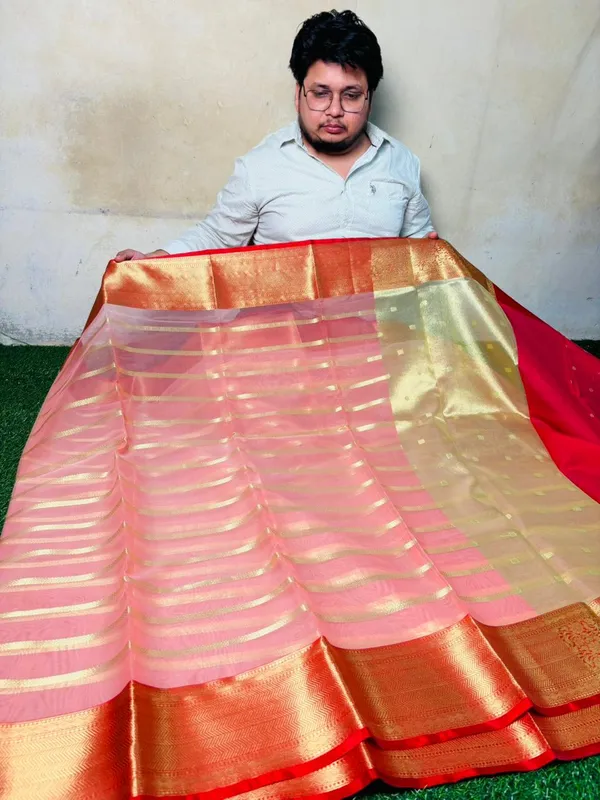 Elegant_Pink_Silk_Saree_With_Golden_Zari_Stripes_And_Contrast_Red_Border