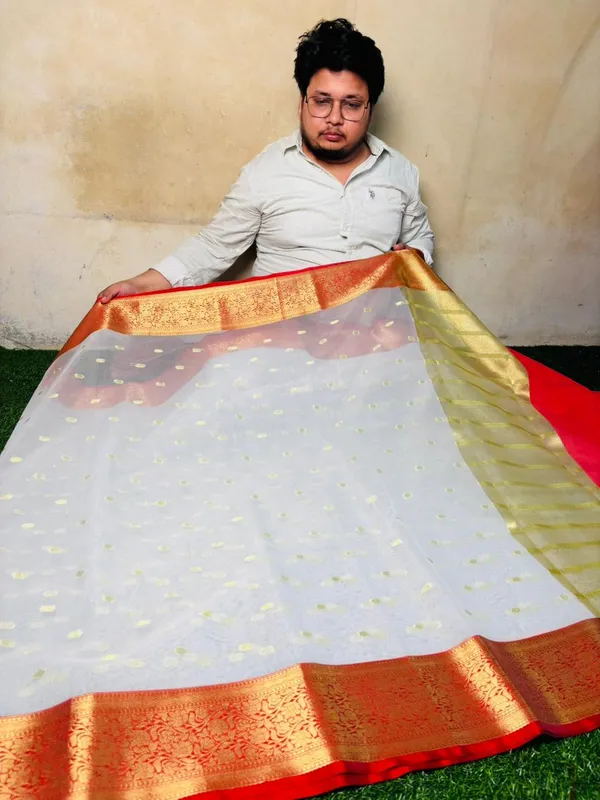 Off_White_Silk_Saree_With_Pink_Golden_Zari_Border_And_Silver_Butis