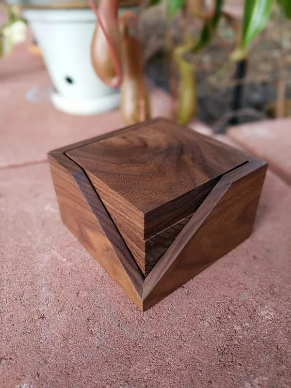 Handcrafted_Wooden_Geometric_Puzzle_Box_With_Layered_Triangle_Design