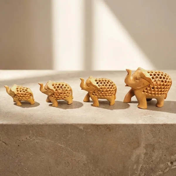 Handcrafted_Decorative_Showpiece_With_Intricate_Lattice_Carving_Wooden_Elephant_Family_Set_Of_4