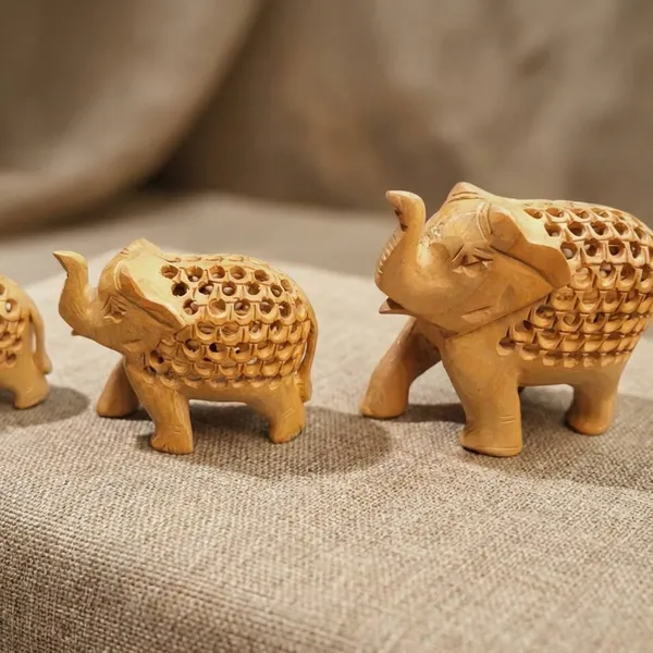 Handcrafted_Decorative_Showpiece_With_Intricate_Lattice_Carving_Wooden_Elephant_Family_Set_Of_4