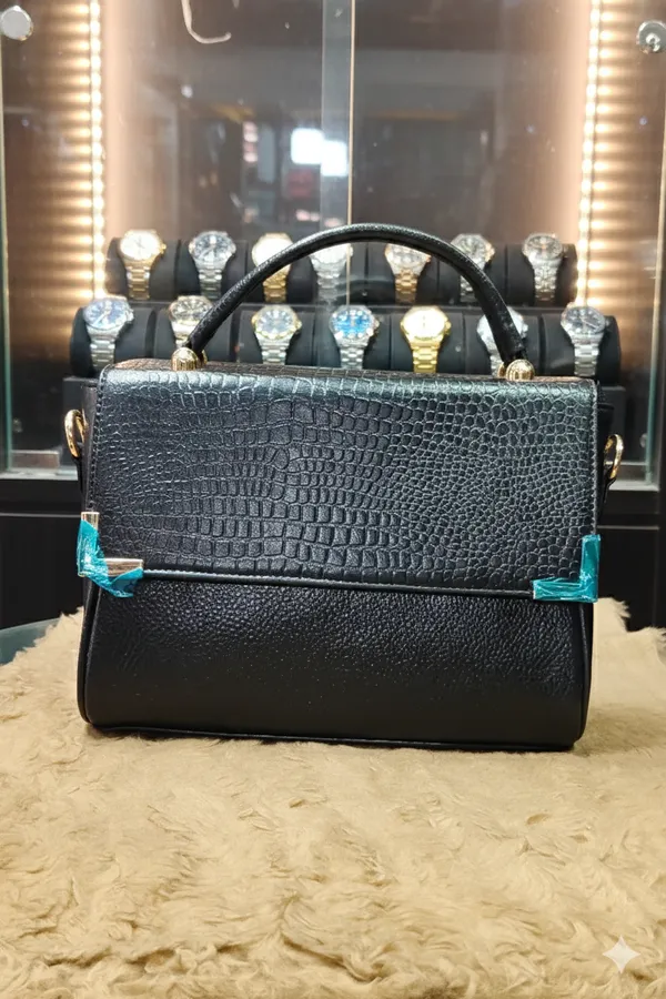 Black_Textured_Satchel_Handbag_With_Blue_Transparent_Corner_Accents