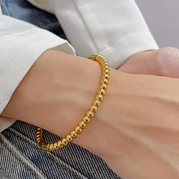 Golden_Stainless_Steel_Round_Bamboo_Wrist_Bracelet_For_Women