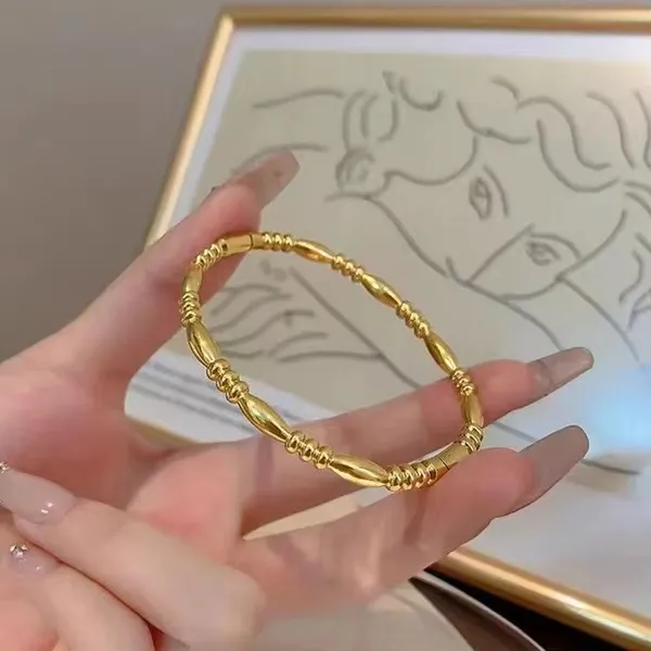 Golden_Stainless_Steel_Round_Bamboo_Wrist_Bracelet_For_Women