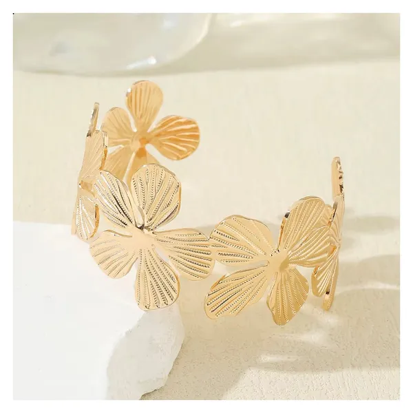 Golden_Stainless_Steel_Textured_Floral_Cuff_Kada_For_Women