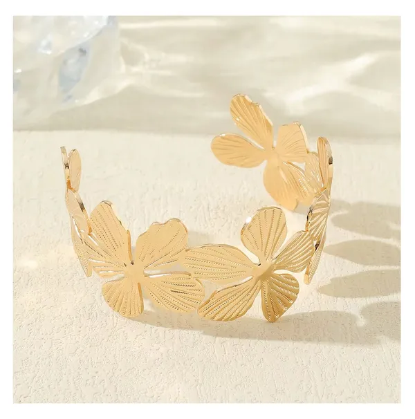 Golden_Stainless_Steel_Textured_Floral_Cuff_Kada_For_Women