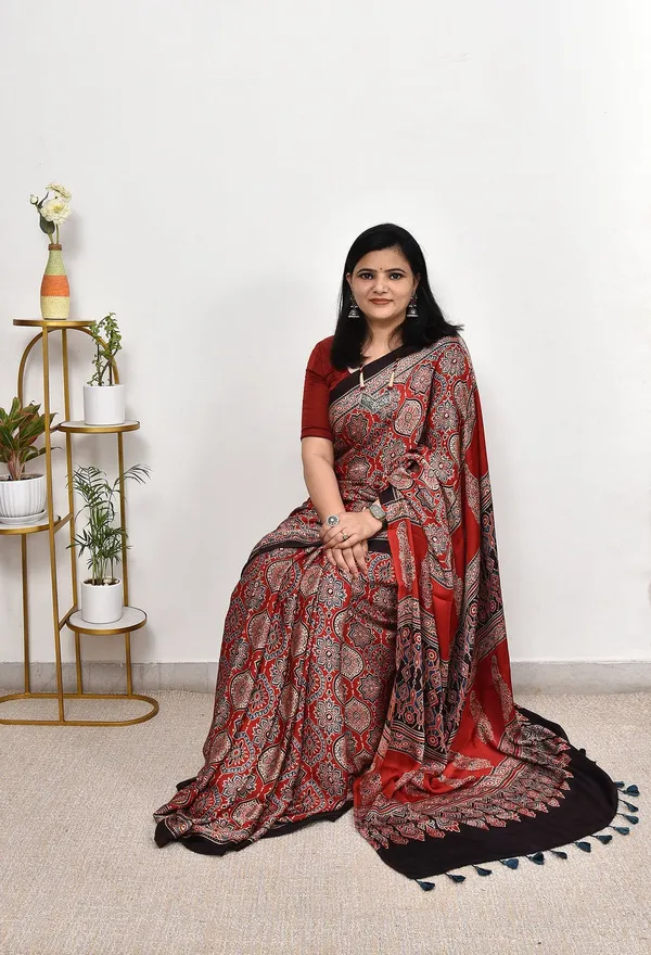 Rust_Red_Ajrakh_Print_Cotton_Saree_with_Designer_Tassel_Pallu