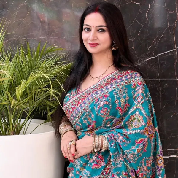 Women’s_Elegant_Teal_Blue_Printed_Designer_Saree_with_Embellished_Border