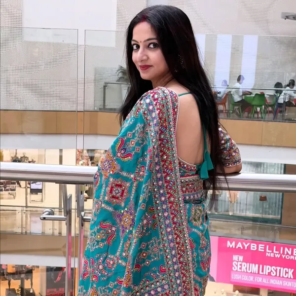Women’s_Elegant_Teal_Blue_Printed_Designer_Saree_with_Embellished_Border
