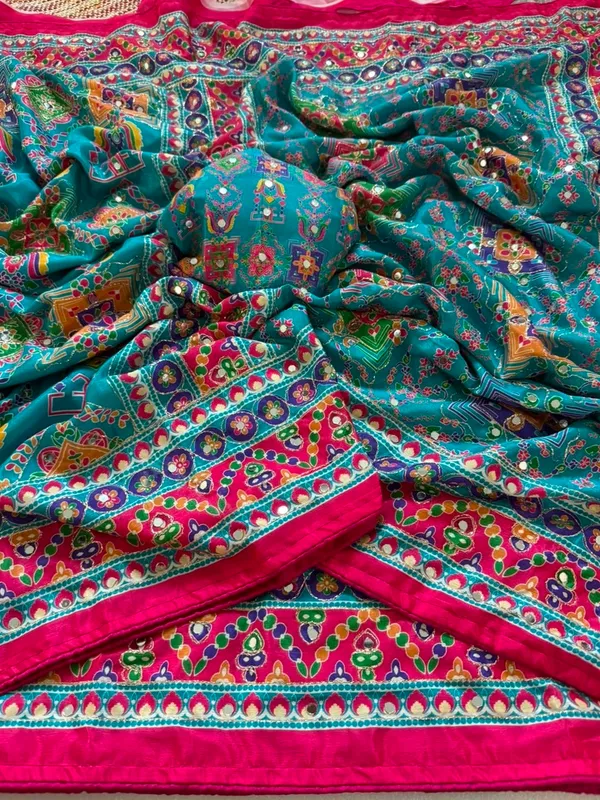 Women’s_Elegant_Teal_Blue_Printed_Designer_Saree_with_Embellished_Border