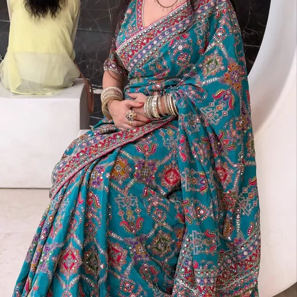 Women’s_Elegant_Teal_Blue_Printed_Designer_Saree_with_Embellished_Border
