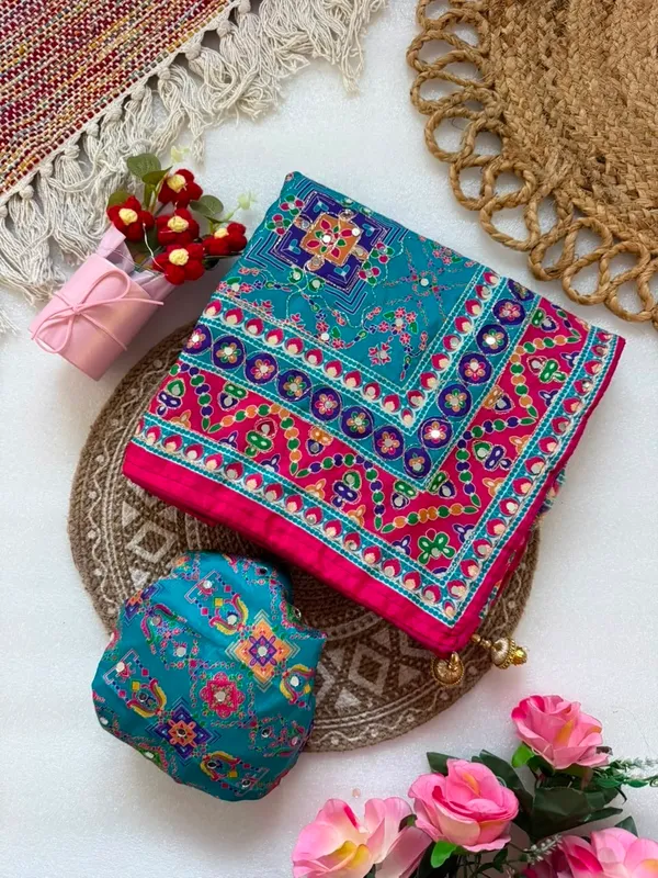 Women’s_Elegant_Teal_Blue_Printed_Designer_Saree_with_Embellished_Border