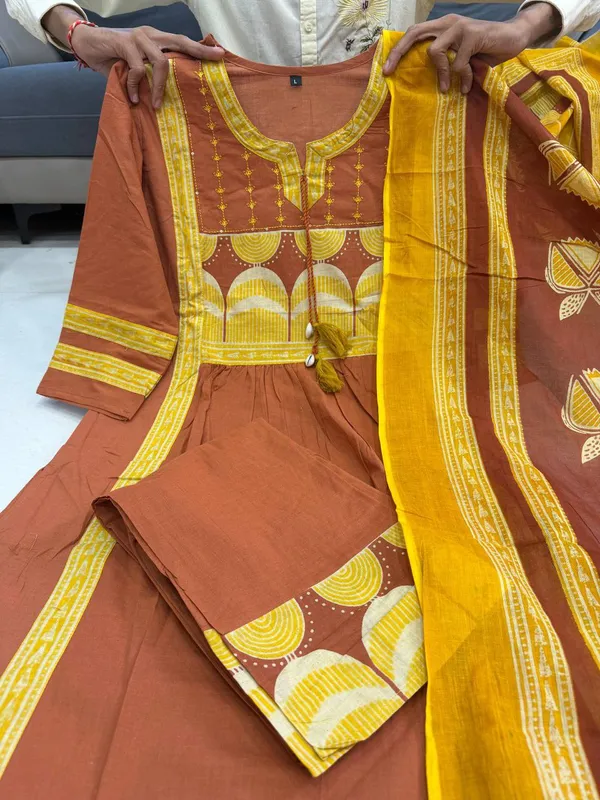 Orange_Printed_Kurta_Set_With_Striped_Pants_And_Dupatta