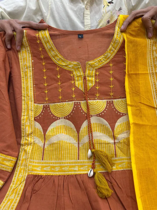 Orange_Printed_Kurta_Set_With_Striped_Pants_And_Dupatta