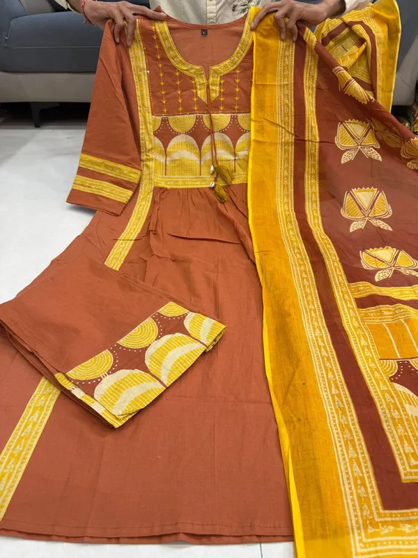 Orange_Printed_Kurta_Set_With_Striped_Pants_And_Dupatta