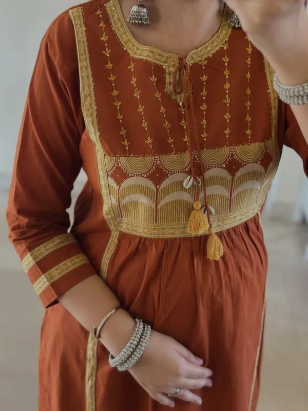 Orange_Printed_Kurta_Set_With_Striped_Pants_And_Dupatta