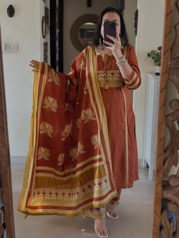 Orange_Printed_Kurta_Set_With_Striped_Pants_And_Dupatta