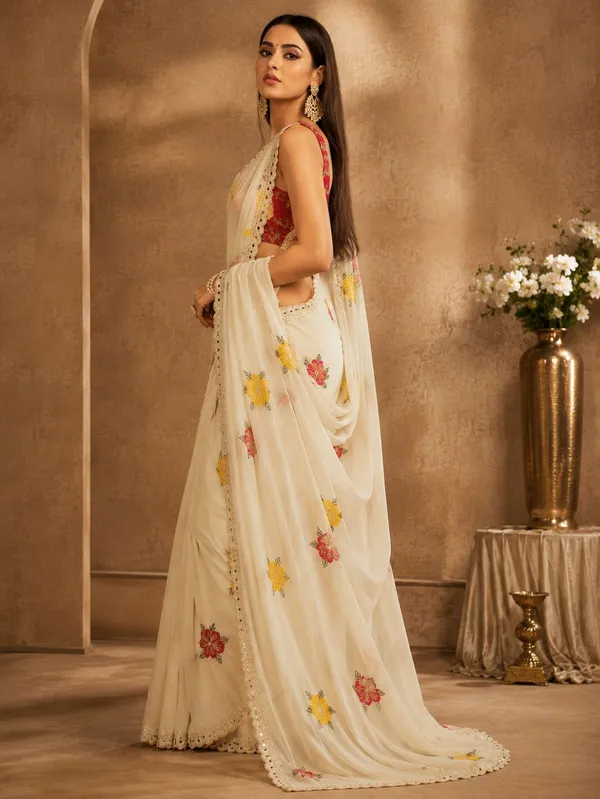 Cream_Rangoli_Fabric_Saree_with_Pink_&_Yellow_Floral_Embroidery