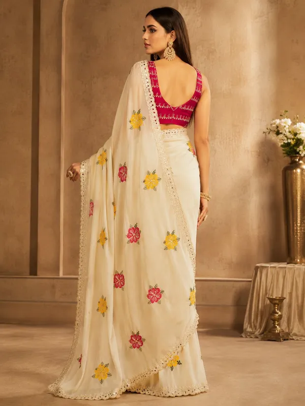 Cream_Rangoli_Fabric_Saree_with_Pink_&_Yellow_Floral_Embroidery
