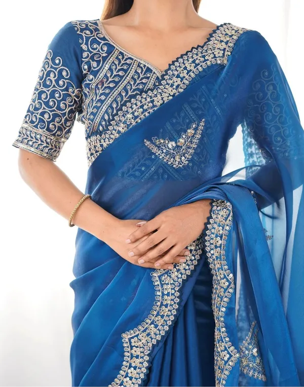 Elegant_Petrol_Organza_Saree_with_Heavy_Embroidered_Blouse_✨