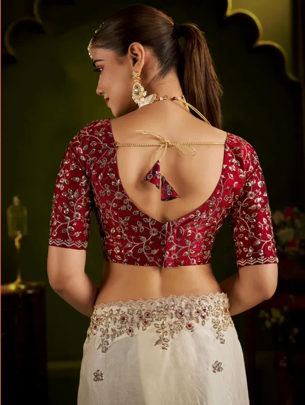 Elegant_Cream_Chiffon_silk_Saree_with_Heavy_Zari_Border_With_Elegant_maroon_colour_blouse