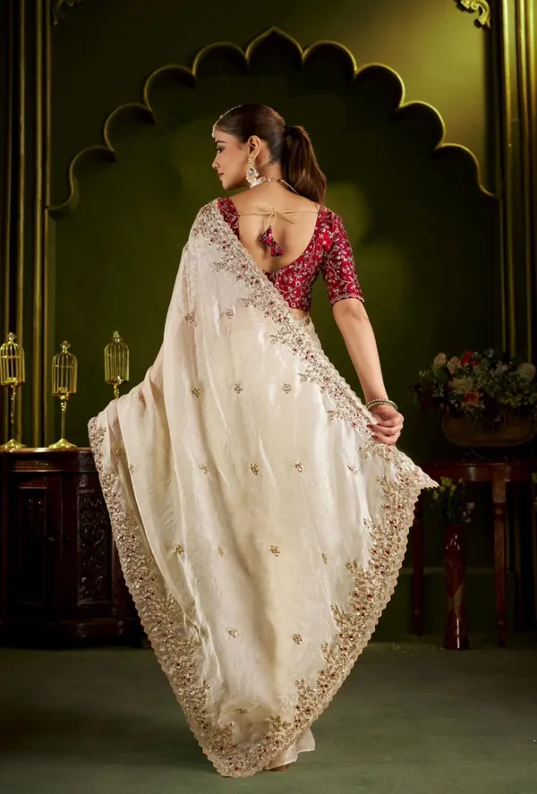 Elegant_Cream_Chiffon_silk_Saree_with_Heavy_Zari_Border_With_Elegant_maroon_colour_blouse
