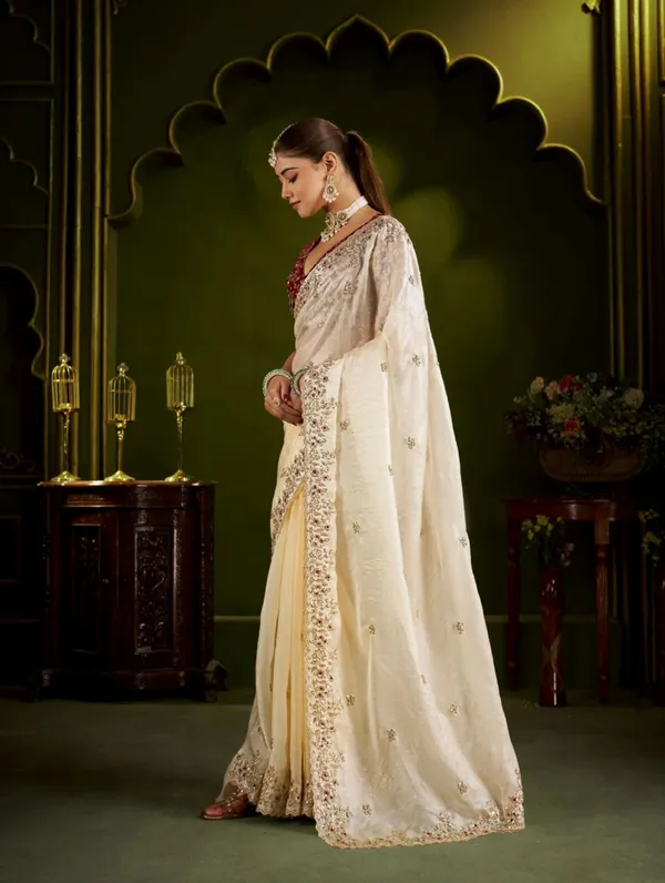Elegant_Cream_Chiffon_silk_Saree_with_Heavy_Zari_Border_With_Elegant_maroon_colour_blouse