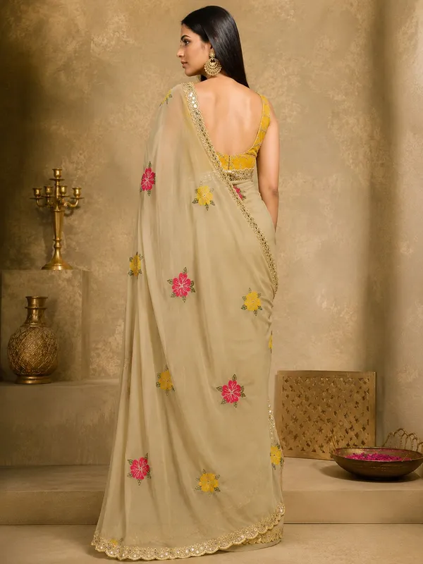 Cream_Rangoli_Fabric_Saree_with_Pink_&_Yellow_Floral_Embroidery